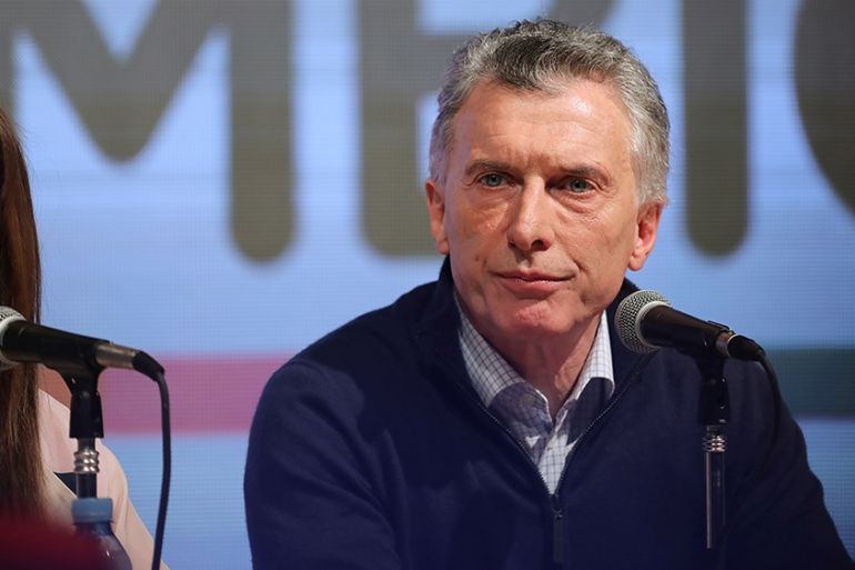 Argentina''s incumbent President and presidential candidate Mauricio Macri is seen on stage during the primary elections, at a convention centre in Buenos Aires, Argentina, August 11, 2019. REUTERS/Lu