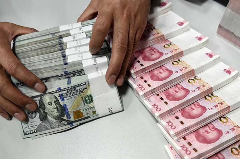 Chinese yuan and U.S. dollar banknotes