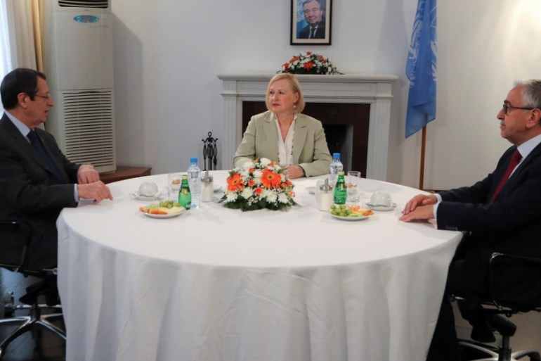 Cyprus President Anastasiades and Turkish Cypriot leader Akinci speak with Elizabeth Spehar, U.N. Special Representative of the Secretary-General and Head of UNFICYP Mission,