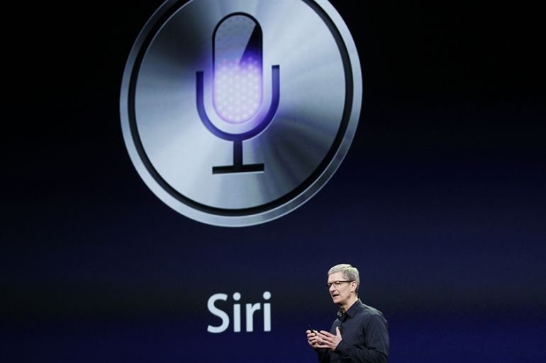 CEO Tim Cook talks about Siri during an Apple event in San Francisco, California March 7, 2012