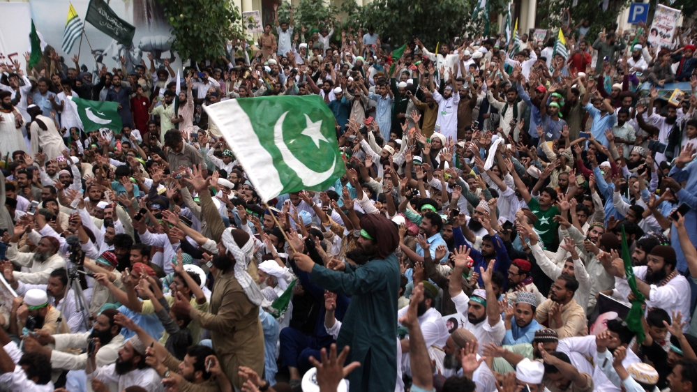 People rally to express solidarity with the people of Kashmir, in Lahore,