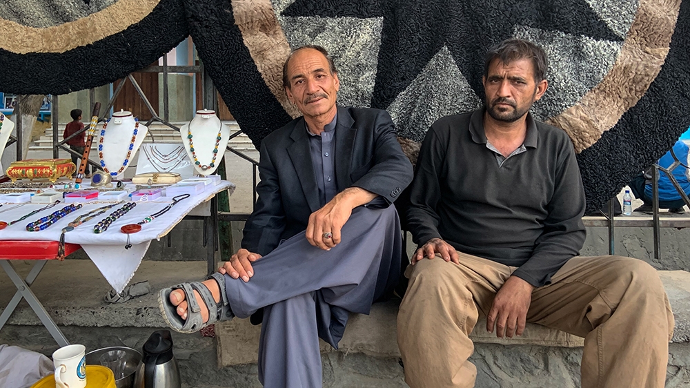 Mohammad Mustafa (R), a retired Air Force general, says no matter who the winner is, he wants an end to the political infighting and name calling that has plagued previous administrations in Afghanist