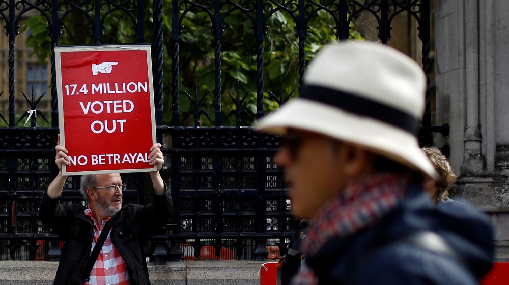 Pro-Brexit protester holds a placard as they demonstrate at Westminster in London, Britain, September 4, 2019