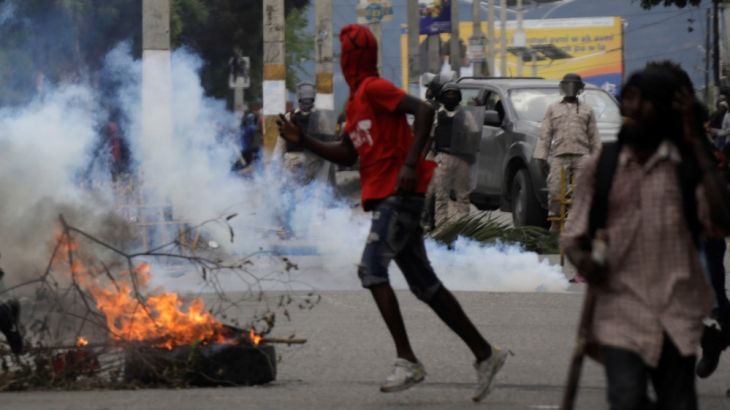People protest to demand the resignation of Haitian President Jovenel Moise, in Port-au-Prince