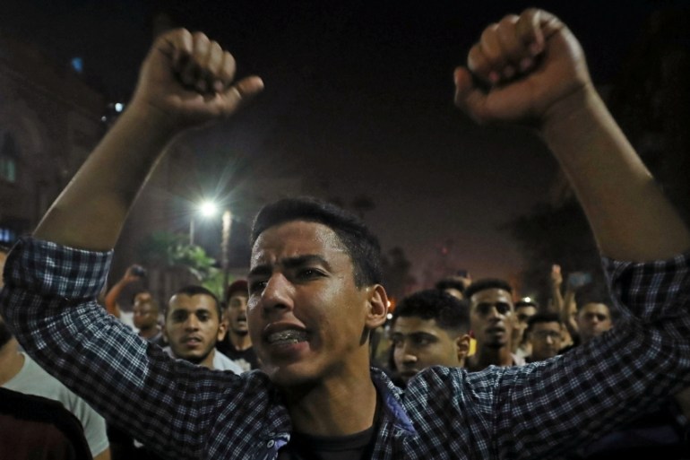 Small groups of protesters gather in central Cairo shouting anti-government slogans in Cairo