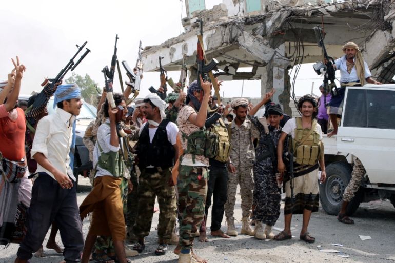 Southern separatist fighters are pictured during clashes with government forces in Aden