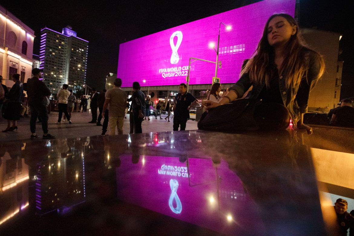 The Qatar 2022 World Cup logo is displayed on a screen at New Arbat street, in Moscow''s downtown, Russia, Tuesday, Sept. 3, 2019. (AP Photo/Pavel Golovkin