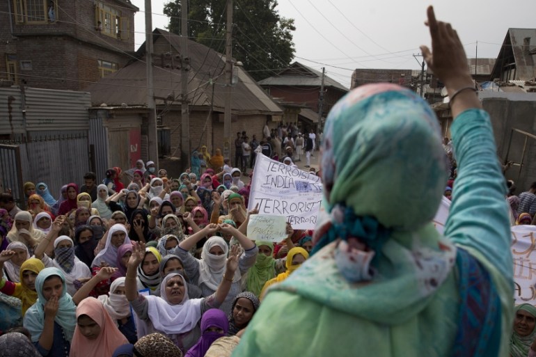 Kashmiri women shout freedom slogans during a protest in Srinagar, Indian controlled Kashmir, Friday, Sept. 27, 2019. The government of Hindu nationalist Prime Minister Narendra Modi imposed an unprec
