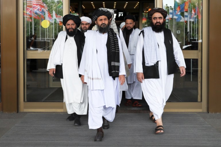 Members of a Taliban delegation leave after peace talks with Afghan senior politicians in Moscow