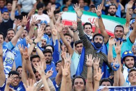 Esteghlal fans cheer during the AFC Champions League Round of 16 soccer match between Esteghlal FC and Al-Ain (UAE) FC at the Azadi Stadium in Tehran, Iran, 22 May 2017. EPA/ABEDIN TAHERKENAREH