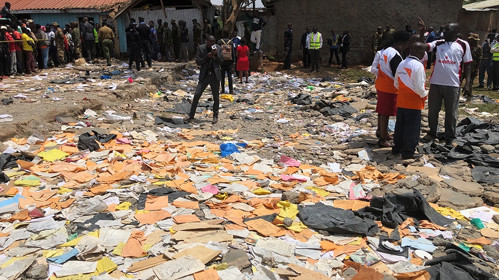 Emergency workers at the site where a school building collapsed, in Nairobi, Kenya, 23 September 2019. According to reports, at least seven primary school children were killed when a classroom structu