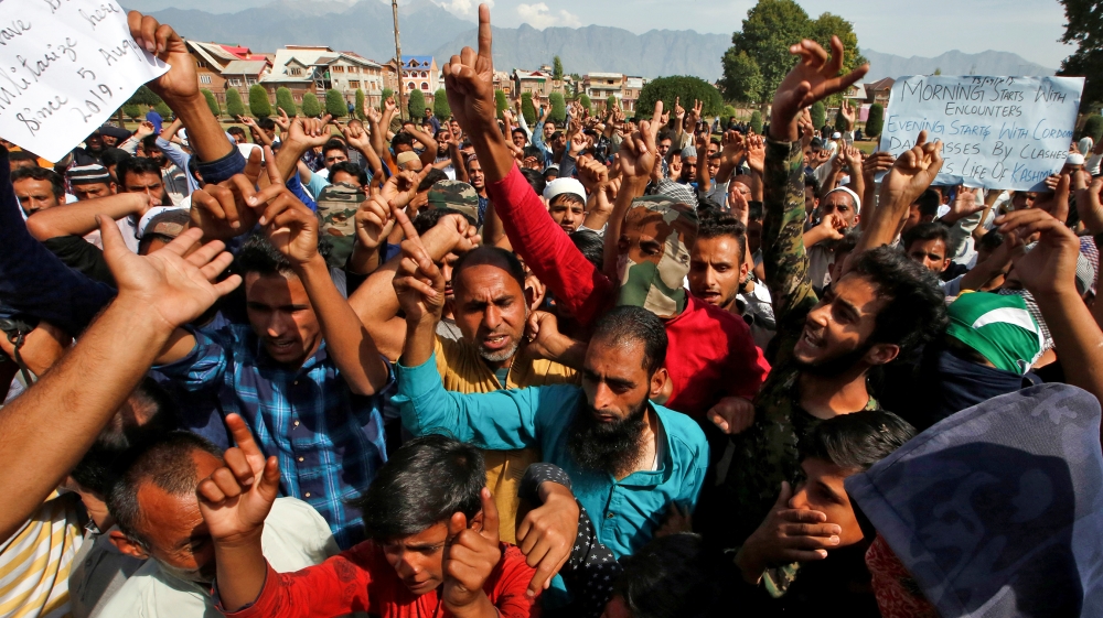 Kashmiris shout slogans at a protest site after Friday prayers during restrictions, following scrapping of the special constitutional status for Kashmir by the Indian government, in Srinagar September