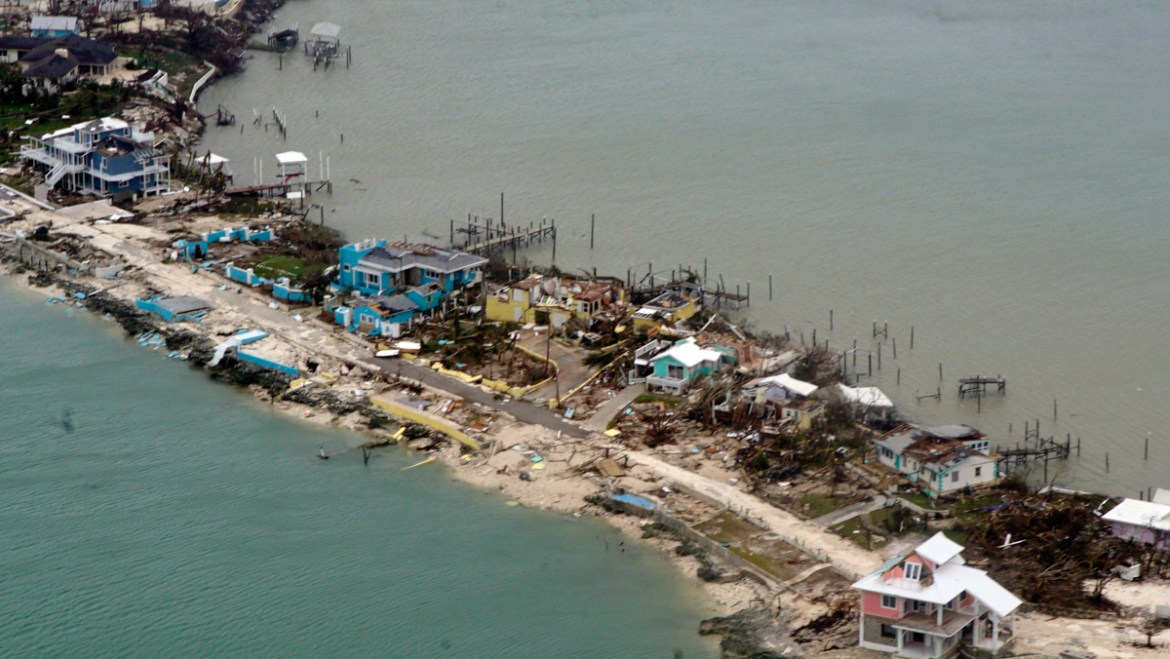 A handout photo made available by the US Coast Guard shows an aerial view of a row of damaged structures in the Bahamas, 03 September 2019, seen from a Coast Guard Elizabeth City C-130 aircraft after