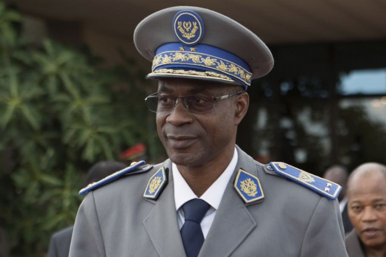 General Diendere arrives at the airport to greet Senegal''s President Sall and Benin''s President Boni in Ouagadougou