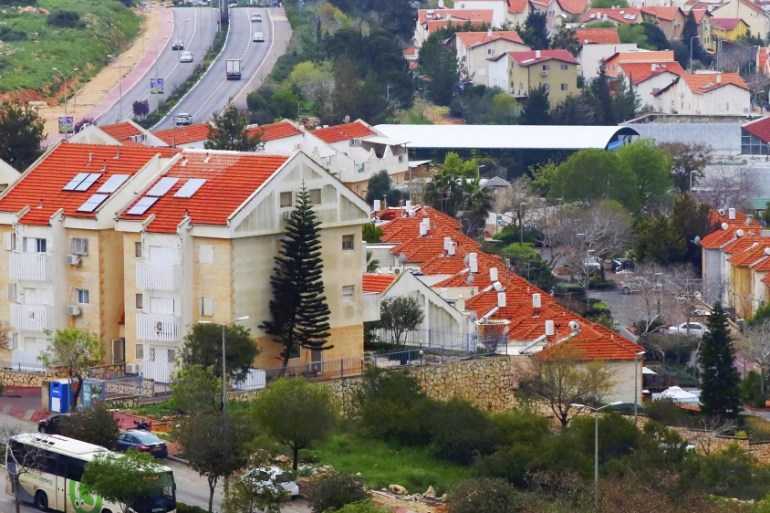 This March 25, 2019 file photo, shows houses in the Israeli settlement of Ariel, in the central West Bank.