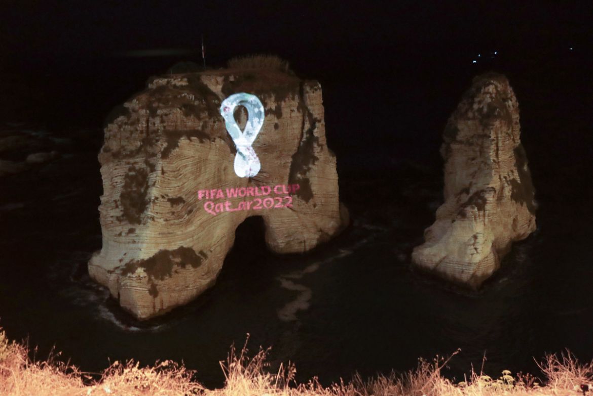 The Fifa World Cup Qatar 2022 logo is projected on the famous Pigon''s Rock landmark in the Lebanese capital Beirut on September 3, 2019. (Photo by Anwar AMRO / AFP)