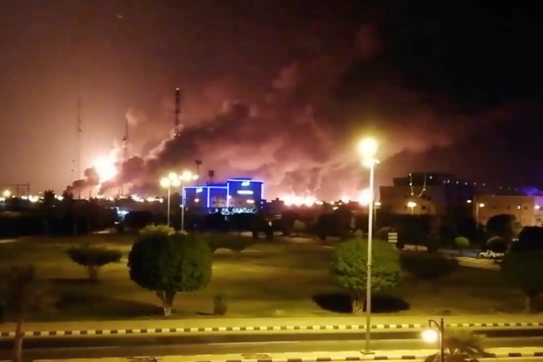Smoke is seen following a fire at an Aramco factory in Abqaiq