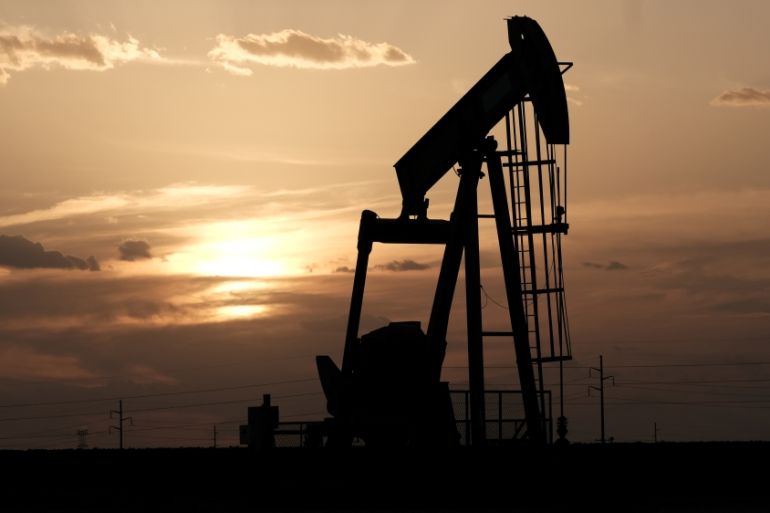 Oil pump jacks work at sunset near Midland, Texas, U.S., August 21, 2019. Picture taken August 21, 2019