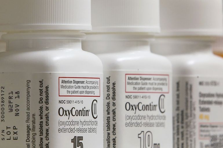 Bottles of Purdue Pharma L.P. OxyContin medication sit on a pharmacy shelf in Provo, Utah, US on Wednesday, Aug. 31, 2016