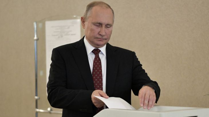 Russia''s President Putin casts his ballot at a polling station during the Moscow city parliament election in Moscow