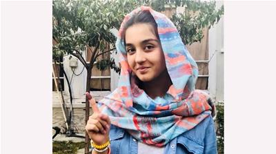 Najmia Popal, 18, a first-time voter [Ali M Latifi/Al Jazeera]