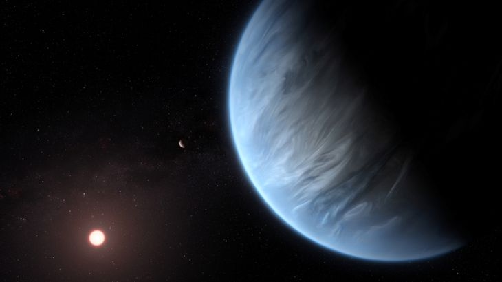 An artist''s impression shows the planet K2-18b, its host star and an accompanying planet