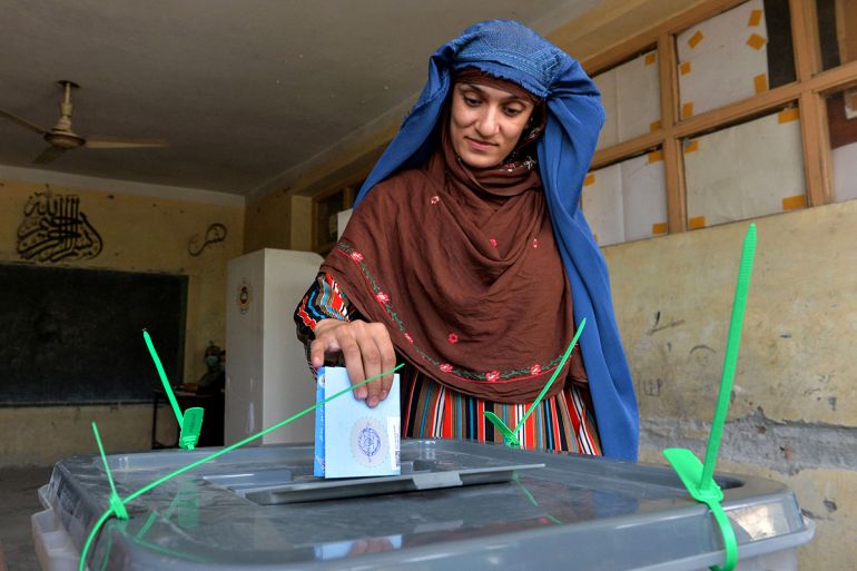 A woman casts her vote at a polling station in Jalalabad on September 28, 2019. Insurgents worked to disrupt Afghanistan''s presidential election on September 28, with a series of blasts reported acros