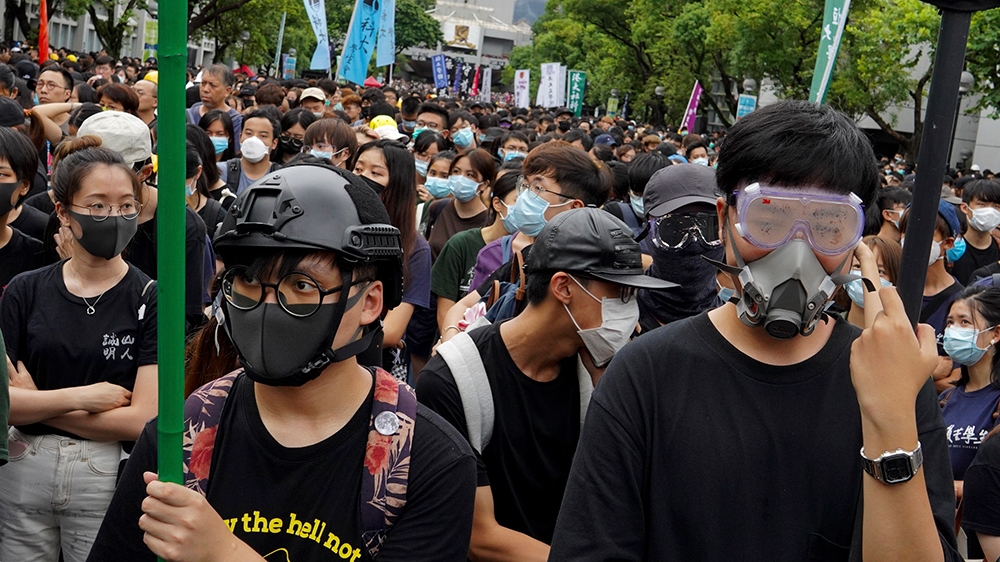 University student wearing safety gear join a strike on the first day of school at the Chinese University in Hong Kong, on Monday, Sept. 2, 2019. The nearly three months of youth-dominated protests ca