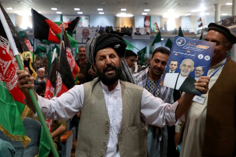 Supporters of Afghan presidential candidate Ashraf Ghani attend his election campaign rally in Kabul, Afghanistan