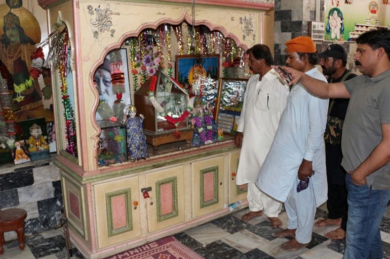 People visit Hindu temples in Sadhu Bhelo, Pakistan, 30 April 2019 (issued 10 May). Sadhu Belo is the biggest site of temples in Pakistan. The complex has eight other temples library, dining areas, hu
