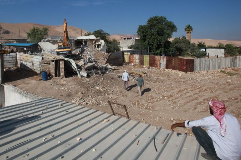 Israeli soldiers demolished three houses of Palestinians