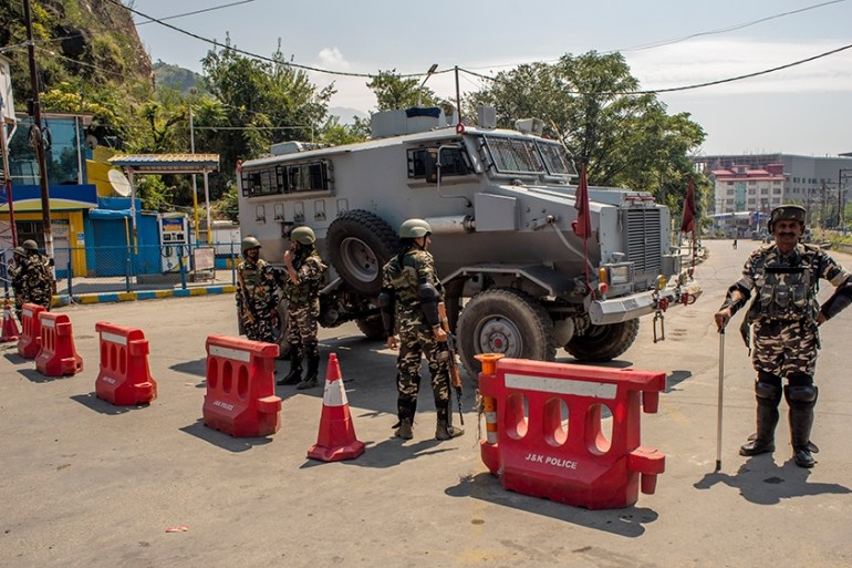 AUGUST 23: Indian paramilitary troopers stand guard as they seal the area leading to the office of United Nations Military Office Group In India and Pakistan (UNMOGIP) for a call to march towards UNMO