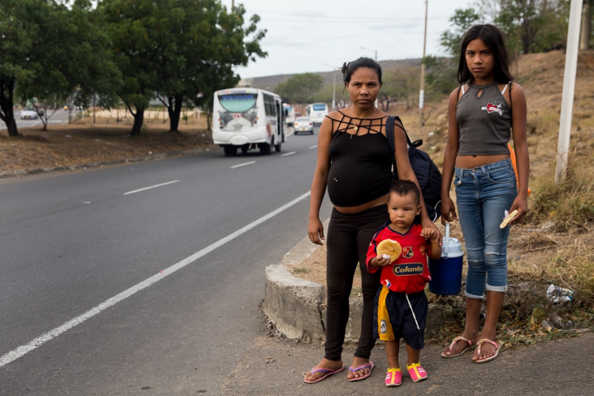 Adriana Hernandez, 27, walked three days with her 2- and 10-year-old children from Portuguesa, Venezuela to the Colombia border, where they crossed through "trocha." She''s entering the final month of