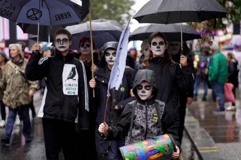 Climate change activists attend an Extinction Rebellion demonstration in London, Britain, October 12, 2019