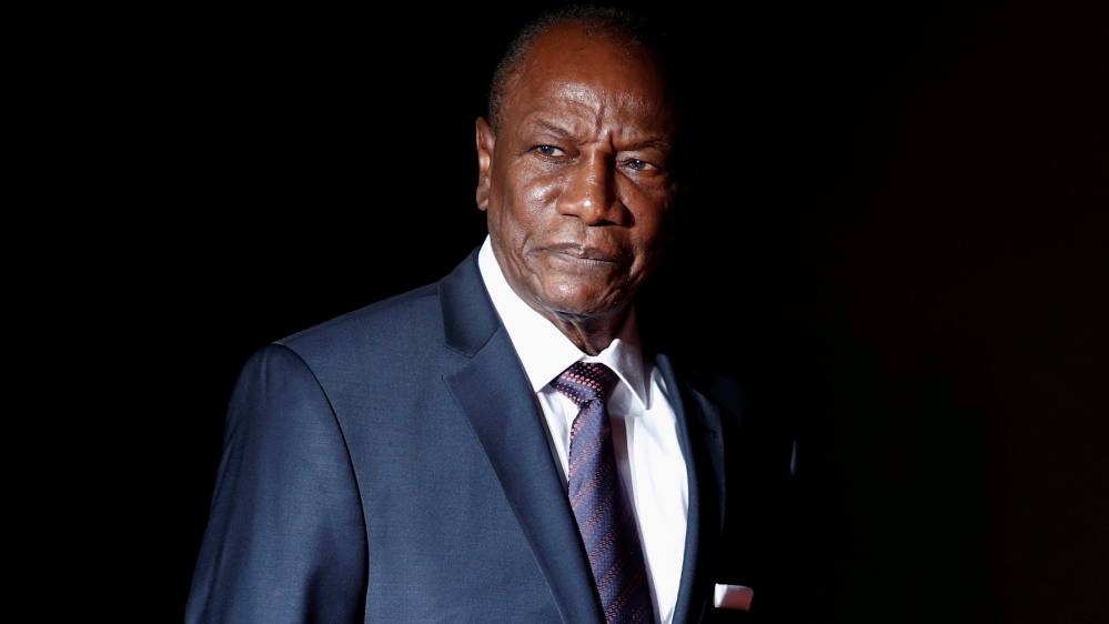 Guinea's President Alpha Conde arrives to attend a visit and a dinner at the Orsay Museum