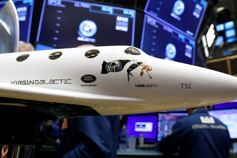 A model of a Virgin Galactic SpaceShipTwo spacecraft is seen on the floor of the New York Stock Exchange (NYSE) as Virgin Galactic (SPCE) begins public trading in New York, U.S., October 28, 201