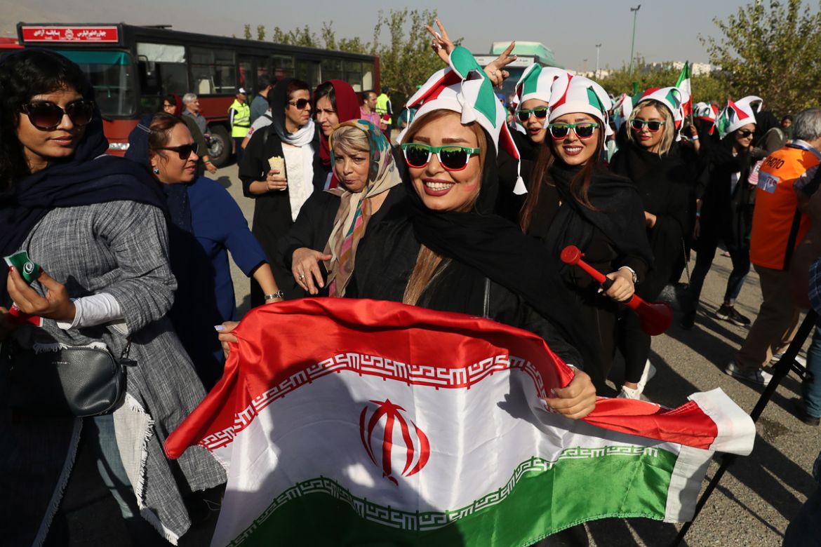Iranian women arrive to the Azadi (Freedom) Stadium to watch the 2022 World Cup qualifier soccer match between Iran and Cambodia, in Tehran, Iran, Thursday, Oct. 10, 2019 Iranian women were freely all