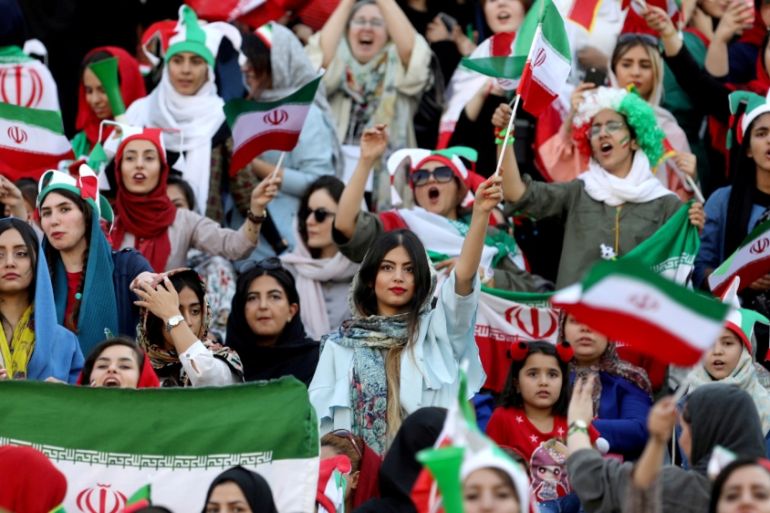 Iranian women attend Iran''s World Cup Asian qualifier against Cambodia at the Azadi stadium in Tehran