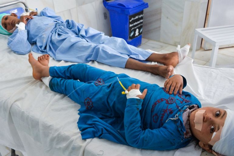 Children receive medical treatment in a hospital after being injured in a bomb blast in Alishang, Laghman province, on October 16, 2019.
