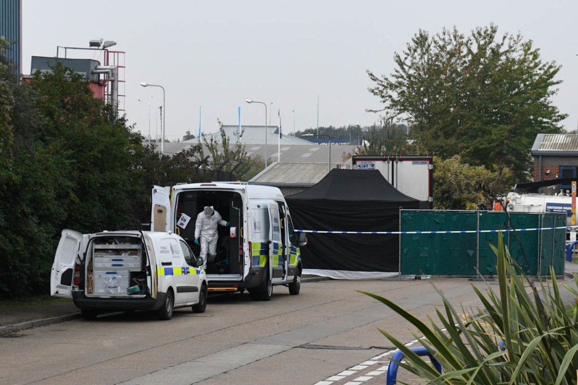 A Police forensic investigation team are parked near the site where 39 bodies were discovered in the back of a lorry on October 23, 2019 in Thurrock, England. The lorry was discovered early Wednesday