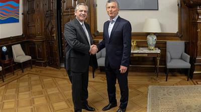 Fernandez and Macri handshake Argentina