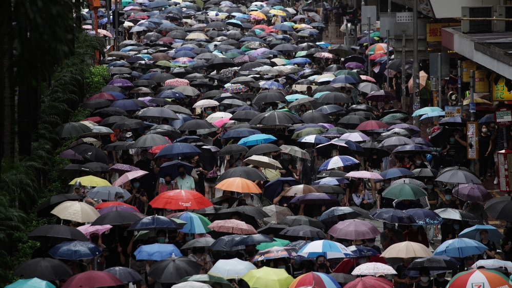 Anti-government protesters attend a demonstration in Wan Chai district, in Hong Kong