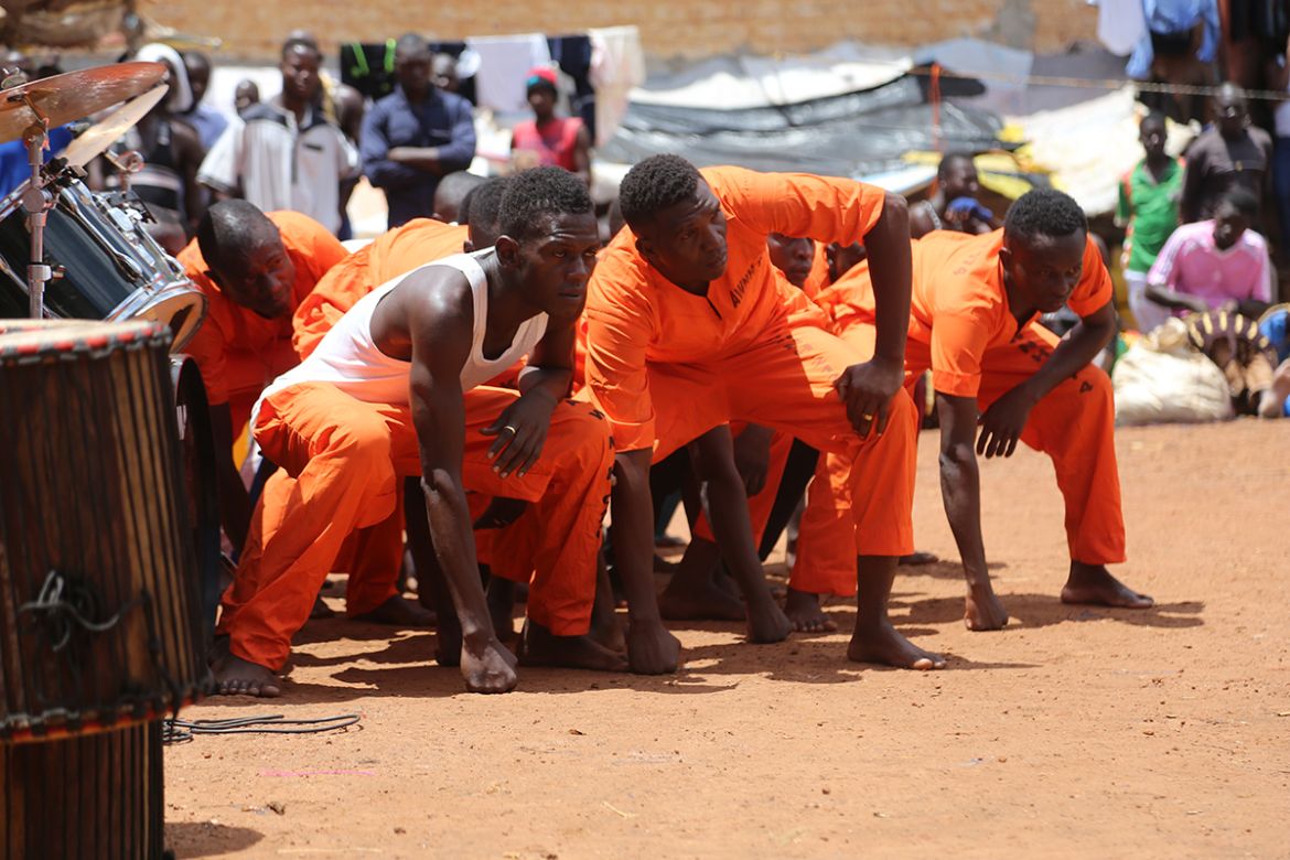 After his personal experience of the therapeutic power of dance, Aguibou decided to share that with an unexpected group of students – inmates at the Bobo Dioulasso prison. [Jacob Bonkian Londry/Al Jaz