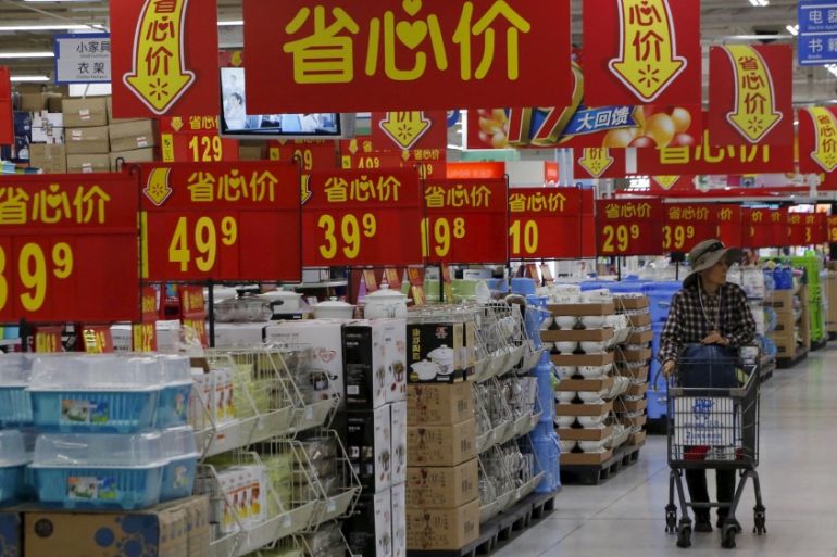 Woman shops at a supermarket in Beijing, China