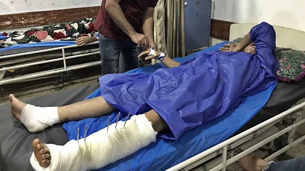 A protester receives treatment after being injured during anti-government protests at a hospital in Baghdad, Iraq, Saturday, Oct. 5, 2019.