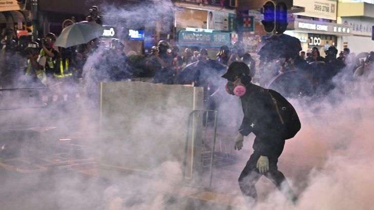 Hong Kong police fire tear gas at Mong Kok as people attend a pro-democracy rally in Kowloon district in Hong Kong on October 20, 2019