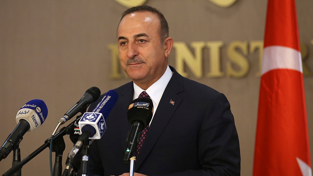 Turkey's Foreign Minister Mevlut Cavusoglu speaks to the media during a joint news conference with Algeria's Foreign Minister Sabri Boukadoum, in Algiers, Algeria, Wednesday, Oct. 9, 2019. Cavusoglu s