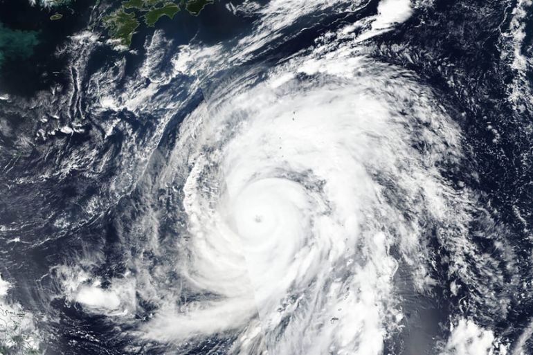 satellite photo taken by NASA-NOAA''s Suomi NPP satellite shows typhoon Hagibis approaching Japan, top. Japan’s weather agency is warning a powerful typhoon