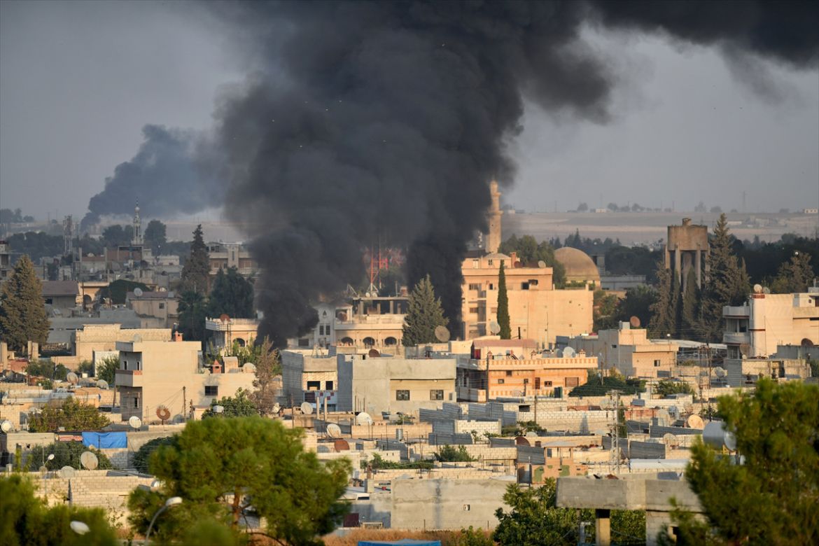 SANLIURFA, TURKEY - OCTOBER 09: A photo taken from Turkey''s Sanliurfa province, on October 09, 2019 shows smoke rises at the site of Ras al-Ayn city of Syria as Turkish troops along with the Syrian Na
