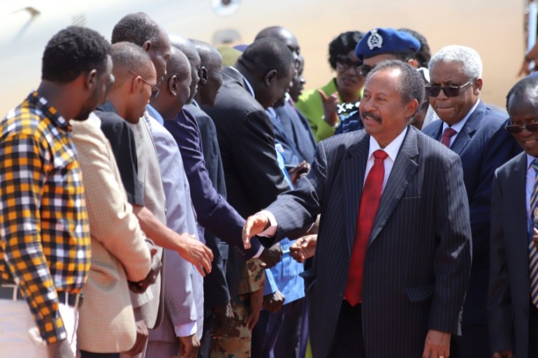 Sudan''s prime minister Abdalla Hamdok arrives to meet Sudan''s ruling council and rebel leaders for a roadmap for peace talks, at the Juba international airport in Juba